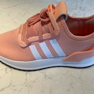 Brand new Adidas sneaker- size 5. No tags. Pale pink/peach color